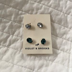 “Diamond” and “Emerald” stud earrings.